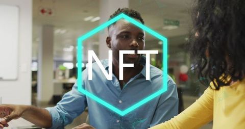 Diverse Coworkers Discussing Cryptocurrency and NFTs in Modern Office