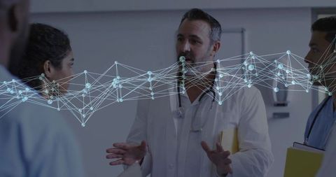 Doctor Discussing with Team and Digital Network Overlay