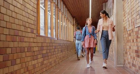 School Hallway Conversation: Students with Teacher - Download Free Stock Images Pikwizard.com
