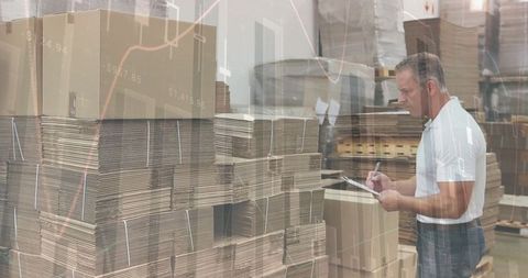 Warehouse Worker Notes with Overlaid Financial Graphs - Download Free Stock Images Pikwizard.com