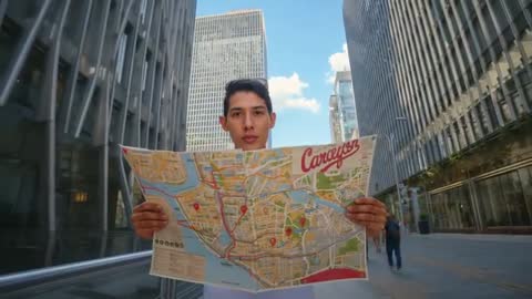 Traveler checking map in financial district plaza scanning skyline for directions
