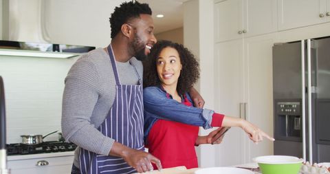 Joyful Couple Baking Together in Modern Kitchen - Download Free Stock Images Pikwizard.com