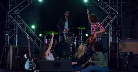 Diverse Band Celebrating Success After Energetic Practice Session - Download Free Stock Images Pikwizard.com