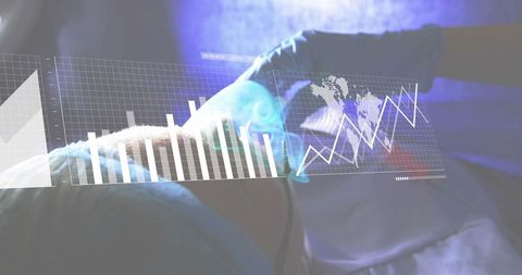 Clinician examining abdomen using augmented reality diagnostics overlay and data charts
