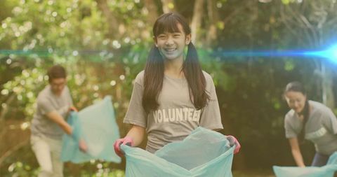 Family volunteering for eco conservation in countryside