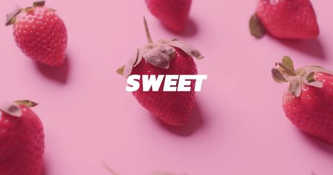 Sweet Strawberries on Pink Background with Text