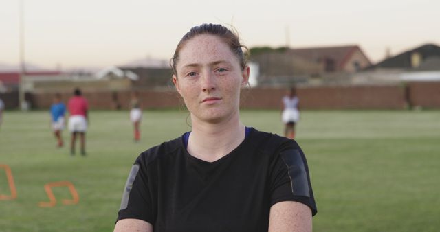 Confident Female Soccer Player Standing on Field - Download Free Stock Images Pikwizard.com