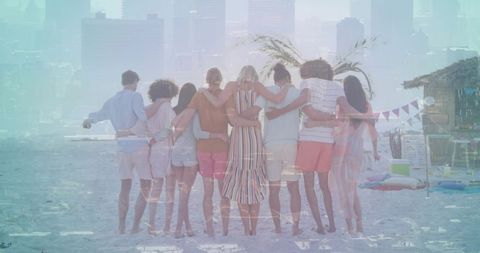 Standing friends linking arms on beach with striped maxi dress and city skyline overlay