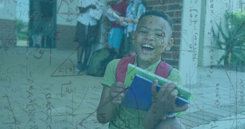 Joyful Student Holding Notebooks Outdoors with Friends at School