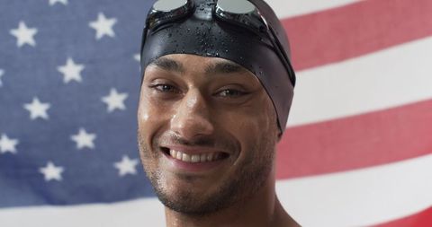 Confident Swimmer with Patriotic Backdrop Reflecting Determination