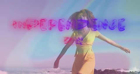 Woman Celebrating Independence Day on Scenic Coastline