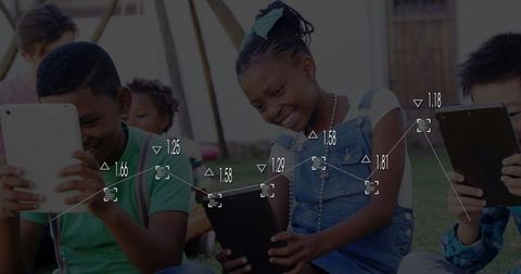 Children Engaging with Technology in Outdoor School Playground