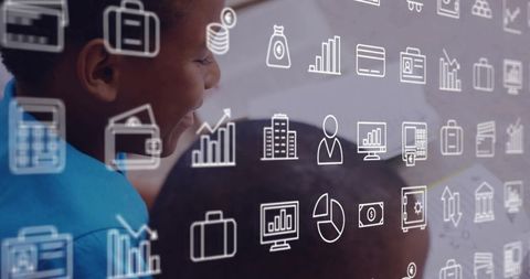 Student watching tablet with floating business icons, smiling, classroom digital learning