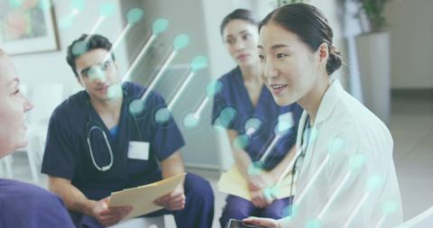 Diverse Medical Team Analyzing DNA Structure in Hospital