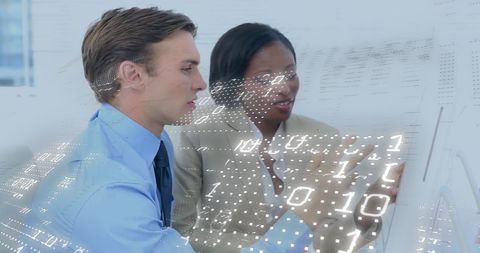 Binary Code Overlay on Diverse Business Professionals Working in Office - Download Free Stock Images Pikwizard.com