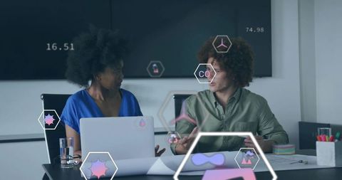 Business Professionals Engaging in High-Tech Data Analysis Meeting