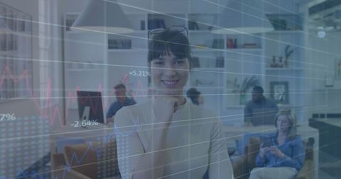 Professional Analyzing Financial Data with Digital Overlay in Modern Office