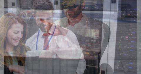 Team Collaborates on IT Solutions in Server Room Environment