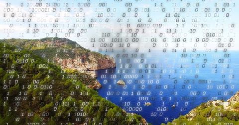 Digital binary overlay on scenic coastal landscape