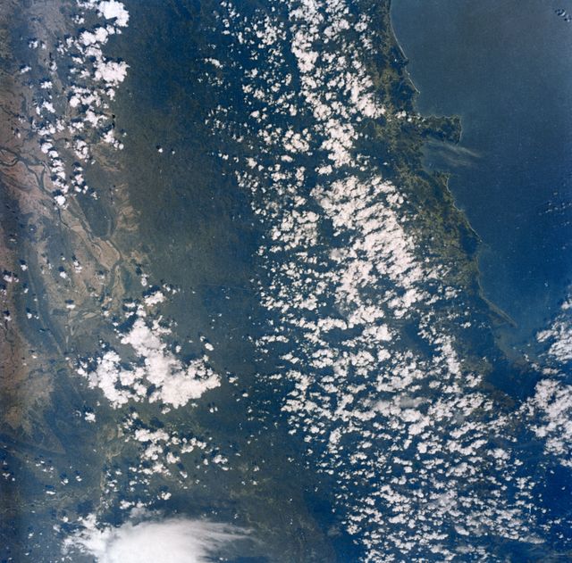 S63-06427 (15-16 May 1963) --- Burma's west coast, west of Rangoon and Irrawaddy River (right), are featured in this image photographed by astronaut L. Gordon Cooper Jr., during his 22-orbit Mercury Atlas 9 (MA-9) spaceflight. Photo credit: NASA