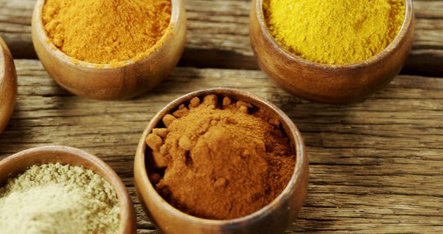 Assorted Spices in Wooden Bowls on Rustic Table - Download Free Stock Images Pikwizard.com