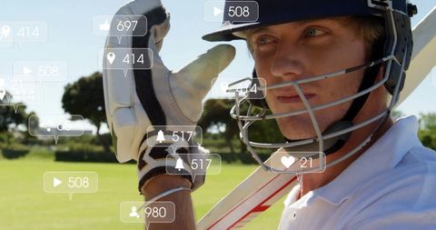 Cricket Player Immersed in Social Media Engagement Overlay - Download Free Stock Images Pikwizard.com