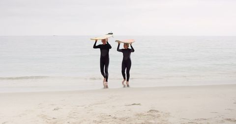 Mature Couple with Surfboards Enjoying Ocean - Download Free Stock Images Pikwizard.com