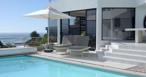 Luxury Oceanfront Retreat with Pool and Lounge Area