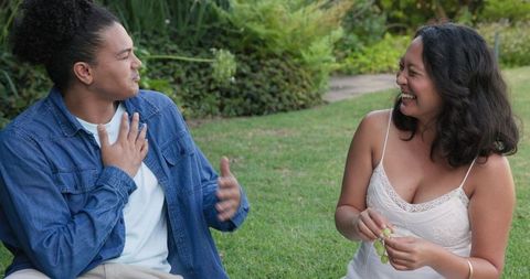 Cheerful Couple Enjoying Outdoor Wedding Celebration