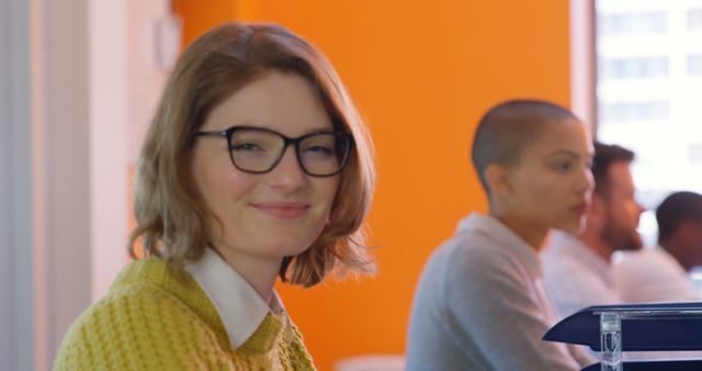 Smiling Woman in Professional Office Environment - Download Free Stock Images Pikwizard.com