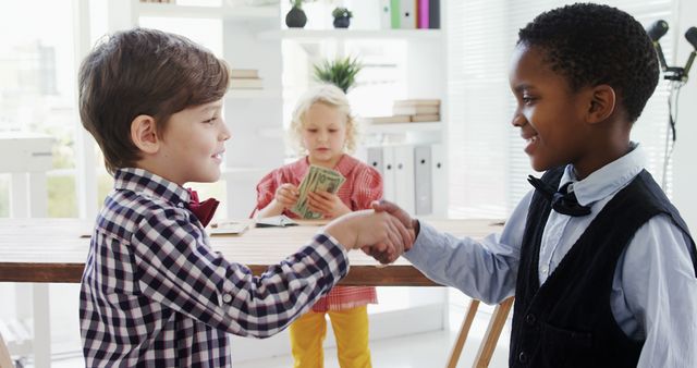 Diverse Group of Kids Making Business Deal Indoors - Download Free Stock Images Pikwizard.com