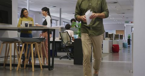 Modern diverse business team collaborating in office
