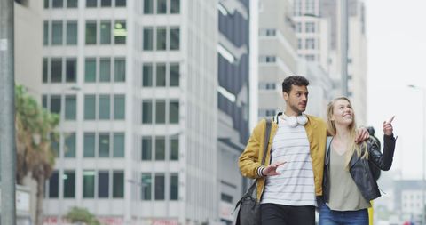 Couple Exploring Urban City Streets Embracing and Chatting Happily - Download Free Stock Images Pikwizard.com