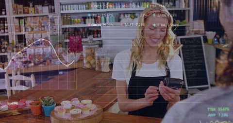 Shop Owner Processing Payment Against Stock Market Graphics - Download Free Stock Images Pikwizard.com