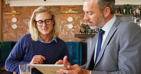 Modern business mentorship with diverse age partners