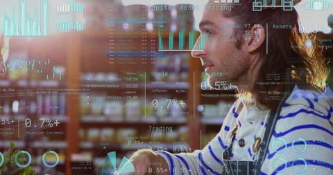 Man analyzing financial data in cafe with augmented reality overlays and warm ambience