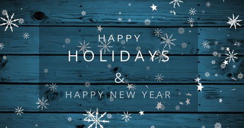 Festive Snowflakes Happy Holidays Card on Blue Wooden Background - Download Free Stock Images Pikwizard.com