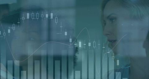 Businesswomen Reviewing Financial Charts and Candlestick Analytics for Strategic Decisions