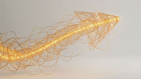 Abstract golden wire curved arrow sculpture with luminous glow