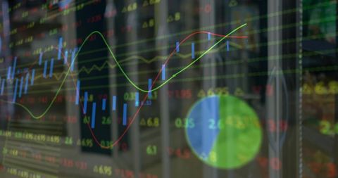 Stock market overlay candlestick charts, trend lines and pie metrics over blurred office