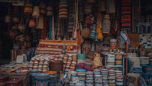 Stacking patterned ceramics and woven baskets in colorful moroccan-style bazaar for decor