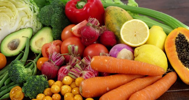 Variety of fresh vegetables and fruits on wooden table - Download Free Stock Photos Pikwizard.com