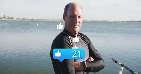 Confident rower receiving online appreciation by bayside