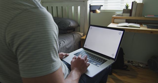 Person Using Laptop on Bed in Cozy Bedroom - Download Free Stock Images Pikwizard.com