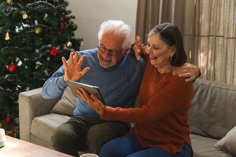Senior Couple Connecting Virtually During Holidays at Home