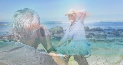 Senior Couple Capturing Memories on Beach