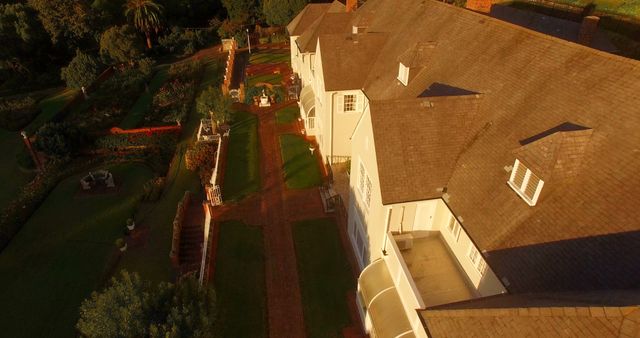 Aerial View of Luxury Estate with Manicured Gardens and Walkways - Download Free Stock Images Pikwizard.com