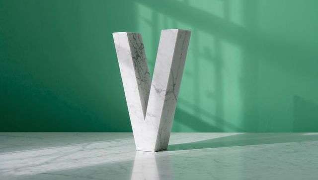 Marble v sculpture on geometric background with window shadow