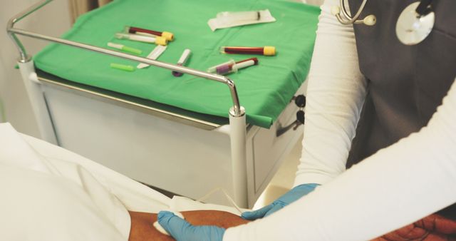 Healthcare professional taking blood sample in clinical setting - Download Free Stock Images Pikwizard.com