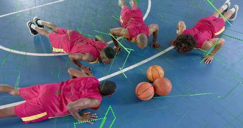 Basketball Team Focused on Fitness Training with Digital Analysis